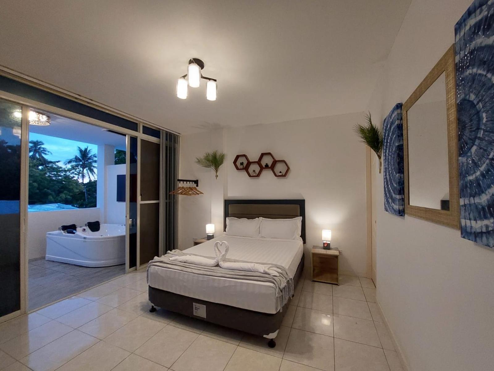 Bonsai Jacuzzi Suites Панглао Экстерьер фото